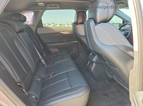 3GYK3EMR6SS212753 2025 CADILLAC OPTIQ Серебряный Вид задней части салона