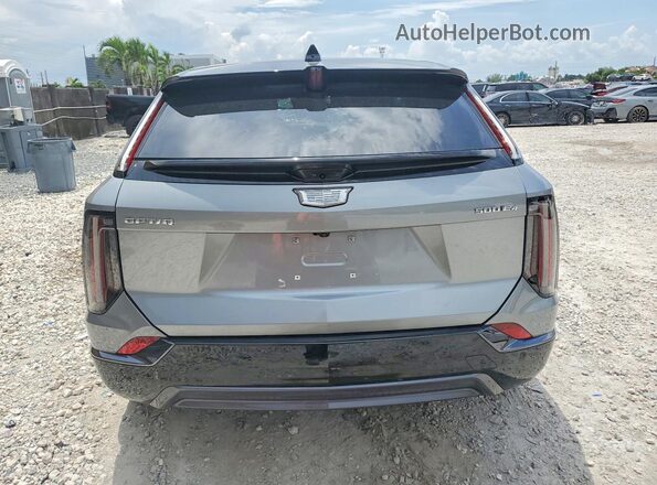 3GYK3EMR9SS233869 2025 CADILLAC OPTIQ Silver Вид ззаду