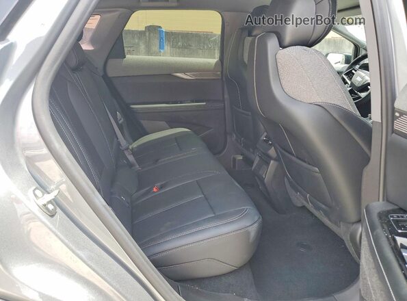 3GYK3EMR9SS233869 2025 CADILLAC OPTIQ Silver Вид задніх сидінь