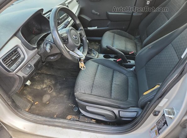 3KPA24AB2JE058299 2018 KIA RIO Silver Front interior view