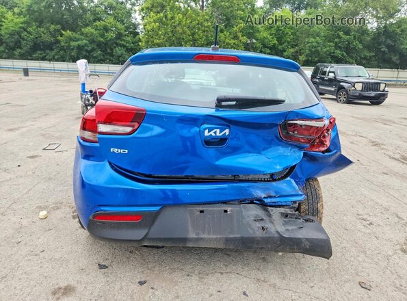 3KPA25AD4PE587575 2023 KIA RIO Blue Widok z tyłu