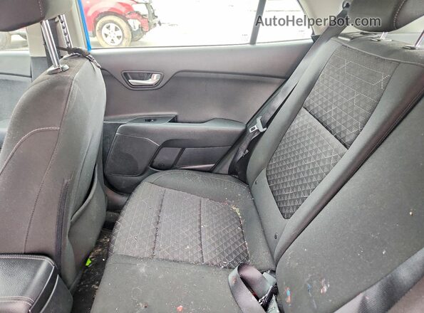 3KPA25AD4PE587575 2023 KIA RIO Blue Widok tylnych siedzeń