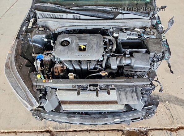 3KPF24AD1RE702524 2024 KIA FORTE Black Вид задньої частини салону