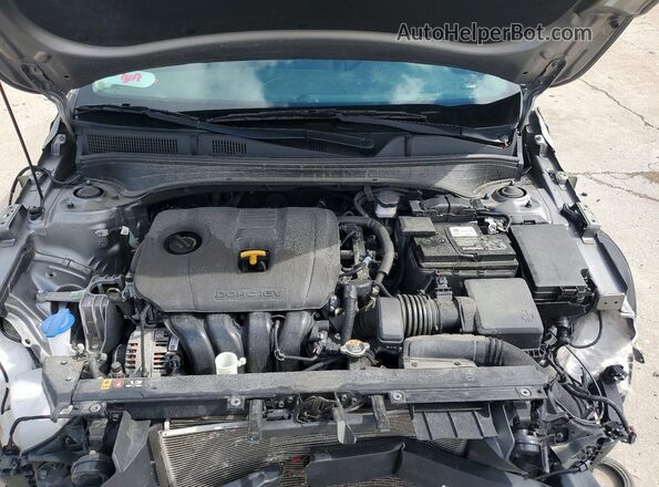 3KPF24AD3RE752342 2024 KIA FORTE Серебряный Вид задней части салона
