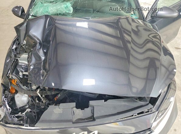 3KPF24AD4RE806831 2024 KIA FORTE Gray Vista interior trasera