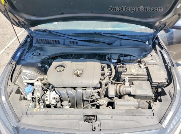 3KPF24AD6RE751475 2024 KIA FORTE Blue Rear interior view