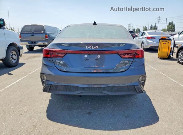 3KPF24AD6RE751475 2024 KIA FORTE Blue Rear view