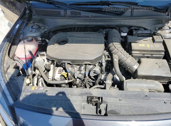 3KPF44AC6RE713262 2024 KIA FORTE Угольный Вид задней части салона