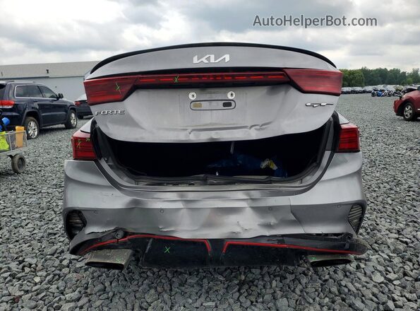 3KPF44AC7PE682469 2023 KIA FORTE Gray Rear view