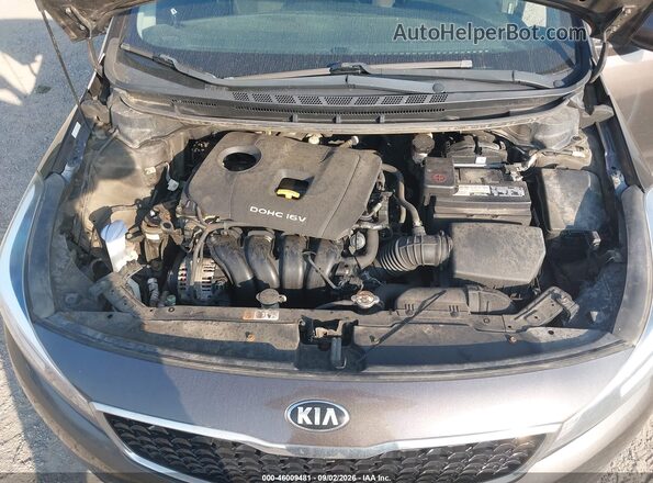 3KPFK4A71JE185093 2018 KIA FORTE Brown Widok z tyłu