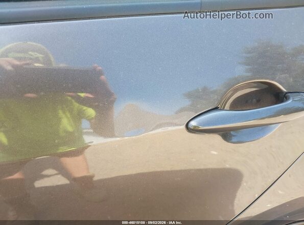 3KPFK4A72JE214262 2018 KIA FORTE Brown Rear interior view
