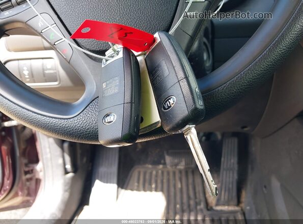 3KPFK4A75JE199529 2018 KIA FORTE Maroon Вид панелі приладів