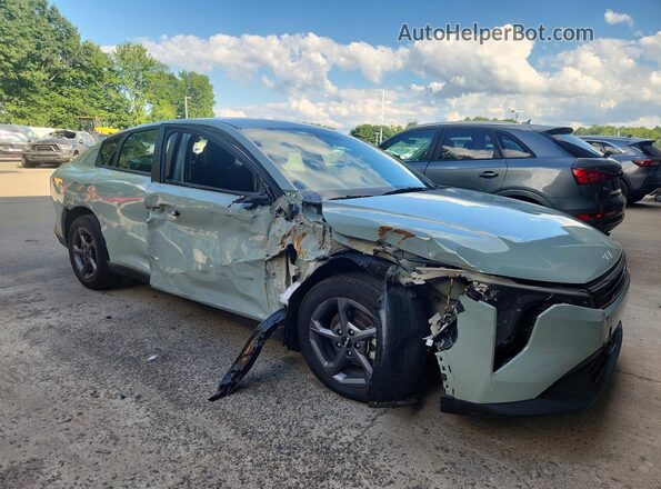 3KPFT4DE2SE111335 2025 KIA K4 Gray Front right