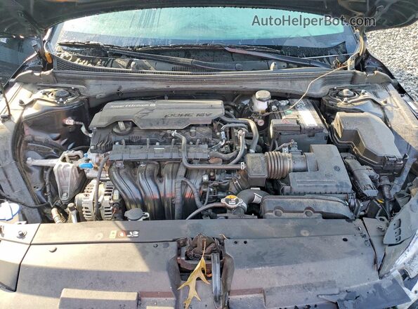 3KPFT4DE5SE015201 2025 KIA K4 Black Սալոնի հետևի տեսք