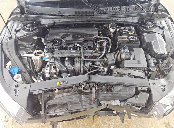 3KPFT4DE7SE182773 2025 KIA K4 Black Սալոնի հետևի տեսք