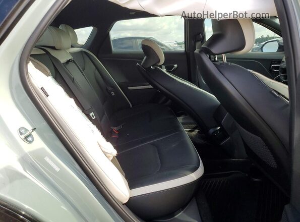 3KPFW4DE5SE220749 2025 KIA K4 Teal უკანა სავარძლების ხედი