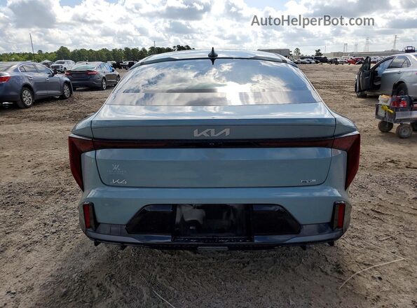 3KPFW4DE5SE220749 2025 KIA K4 Teal უკანა ხედი