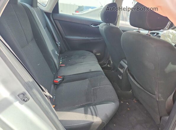 3N1AB7AP1JY294862 2018 NISSAN SENTRA Silver Вид задньої частини салону