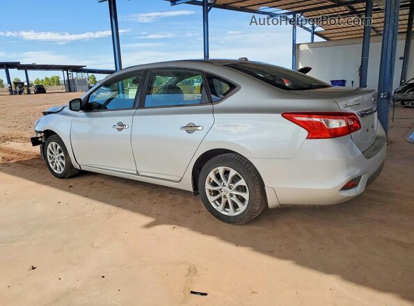 3N1AB7AP4KY235662 2019 NISSAN SENTRA Silver Trasero izquierdo