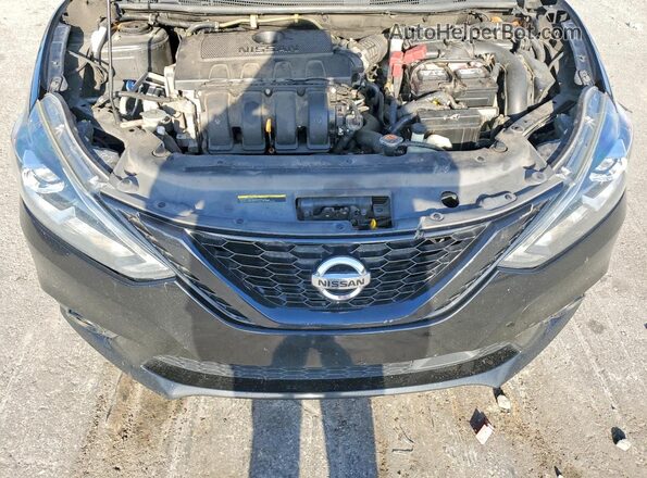 3N1AB7AP7JY277323 2018 NISSAN SENTRA Черный Вид задней части салона
