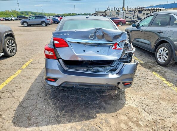 3N1AB7AP8JY257842 2018 NISSAN SENTRA Серебряный Вид сзади