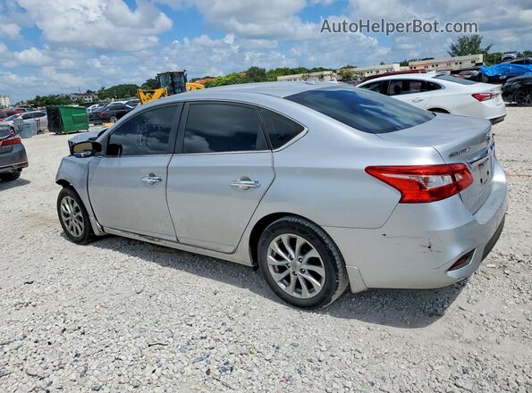 3N1AB7APXJY266283 2018 NISSAN SENTRA Silver Trasero izquierdo