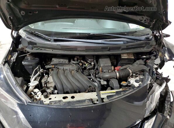 3N1CE2CP3JL361801 2018 NISSAN VERSA Black Vista interior trasera