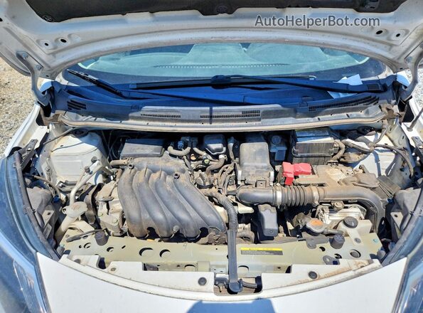3N1CE2CPXKL357083 2019 NISSAN VERSA White Vista interior trasera