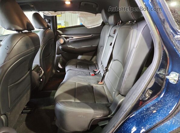 3PCAJ5L37NF111061 2022 INFINITI QX55 Blue Vista interior trasera