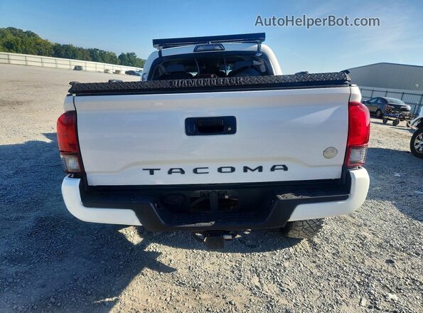 3TMAZ5CN0KM085002 2019 TOYOTA TACOMA White Vista trasera