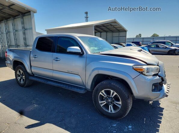 3TMAZ5CN0KM090622 2019 TOYOTA TACOMA Silver Front right