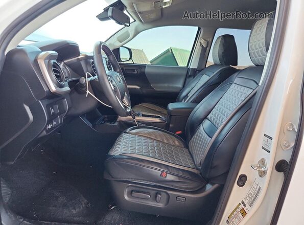 3TMAZ5CN1MM158915 2021 TOYOTA TACOMA White Widok wnętrza z przodu