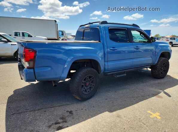 3TMAZ5CNXKM099568 2019 TOYOTA TACOMA Blue Tył prawy