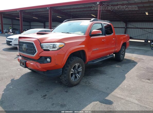 3TMBZ5DN3JM013020 2018 TOYOTA TACOMA Orange Vista tres cuartos delantera izquierda