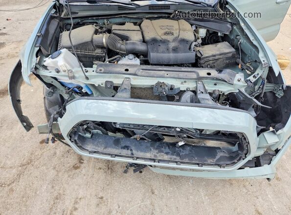 3TMCZ5AN0PM562904 2023 TOYOTA TACOMA Green Սալոնի հետևի տեսք