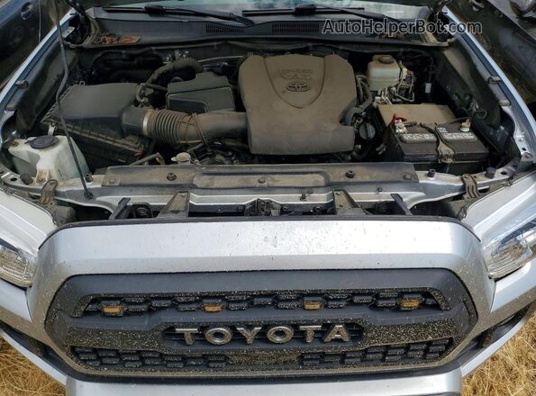 3TMCZ5AN3NM469744 2022 TOYOTA TACOMA Silver Սալոնի հետևի տեսք