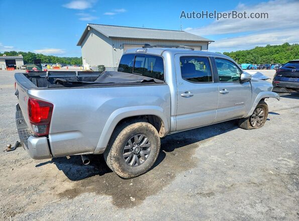 3TMCZ5AN3PM609990 2023 TOYOTA TACOMA Серебряный Задняя правая четверть