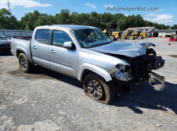 3TMCZ5AN3PM609990 2023 TOYOTA TACOMA Серебряный Передняя правая четверть