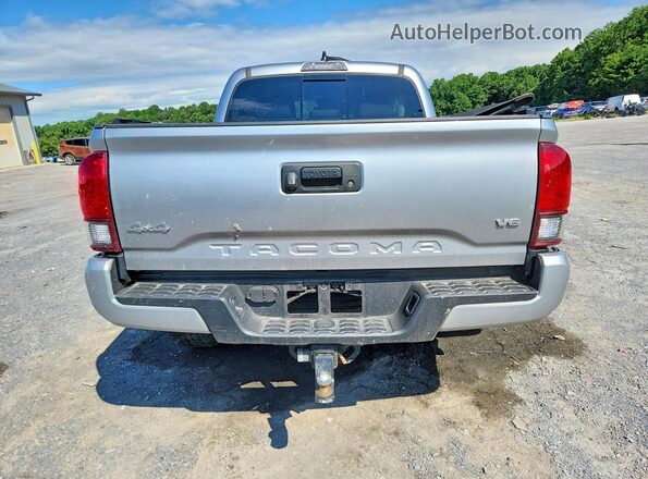 3TMCZ5AN3PM609990 2023 TOYOTA TACOMA Серебряный Вид сзади