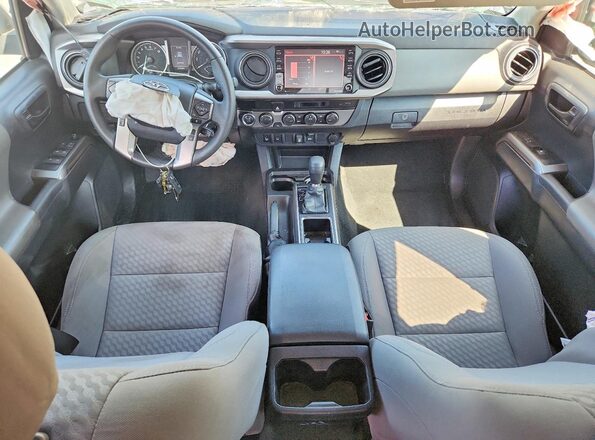 3TMCZ5AN3PM609990 2023 TOYOTA TACOMA Серебряный Вид панели приборов