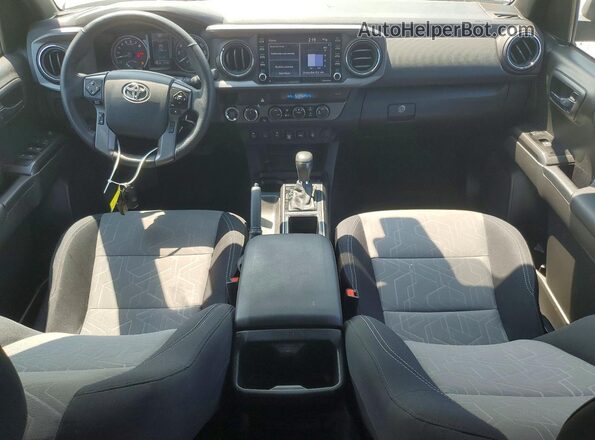 3TMCZ5AN4PM651441 2023 TOYOTA TACOMA Серебряный Вид панели приборов