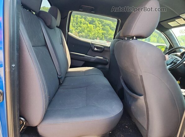 3TMCZ5AN5HM081144 2017 TOYOTA TACOMA Blue Vista de los asientos traseros