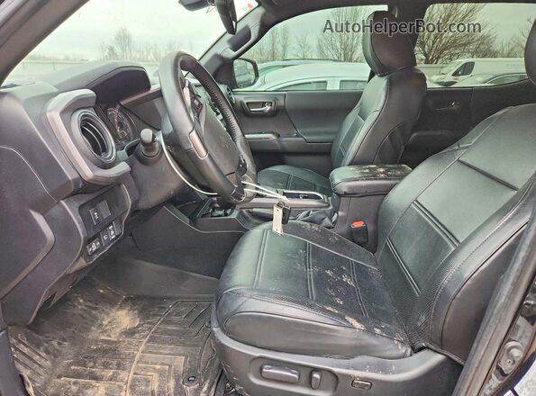 3TMCZ5AN6PM540941 2023 TOYOTA TACOMA Черный Вид салона спереди