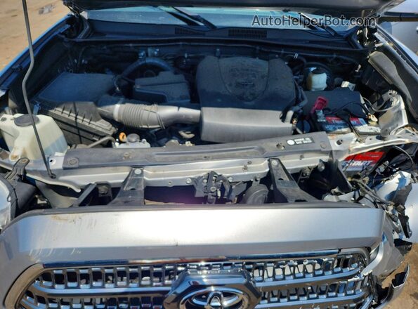 3TMCZ5AN7HM078021 2017 TOYOTA TACOMA Silver Rear interior view