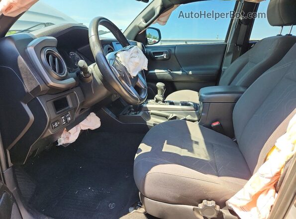 3TMCZ5AN7HM078021 2017 TOYOTA TACOMA Silver Front interior view
