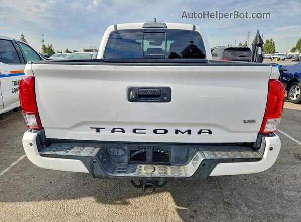 3TMCZ5ANXKM260853 2019 TOYOTA TACOMA White Հետևի տեսք