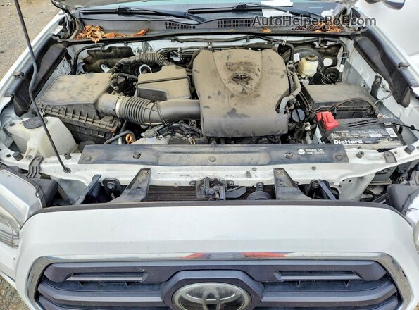 3TMDZ5BN1JM045850 2018 TOYOTA TACOMA Белый Вид задней части салона
