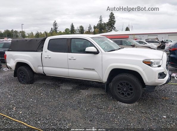 3TMDZ5BN2KM073786 2019 TOYOTA TACOMA White Vista interior trasera