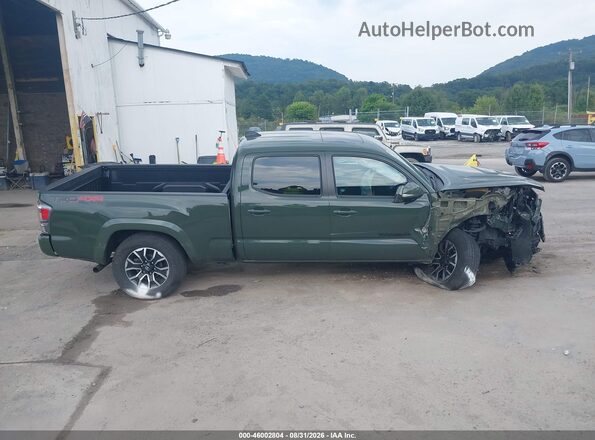 3TMDZ5BN9NM126570 2022 TOYOTA TACOMA Green Вид задньої частини салону