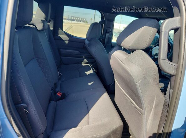 3TMKB5FN9TM071783 2026 TOYOTA TACOMA Blue Rear seats view